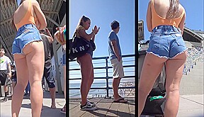 delicious little woman in shorts teasing men