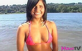 gorgoeus petite teen teases us at the beach